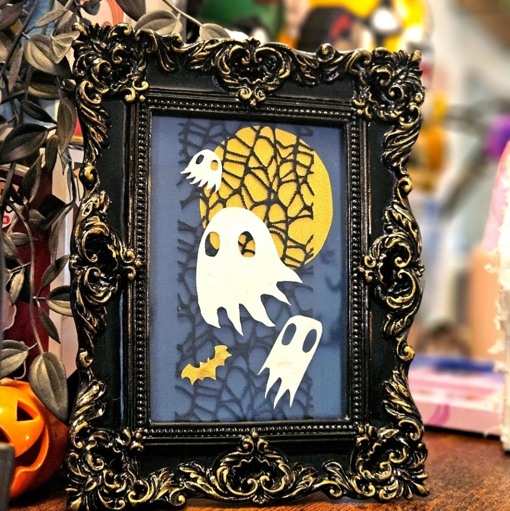 Ghost Paper Cut Art in Hand-Painted Black Frame